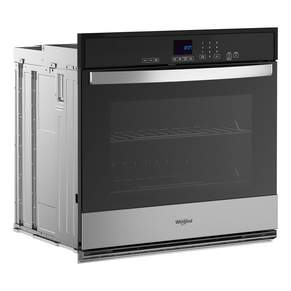 Self-cleaning built-in wall oven with black glass door, stainless steel handle, and digital control panel from Appliances collection