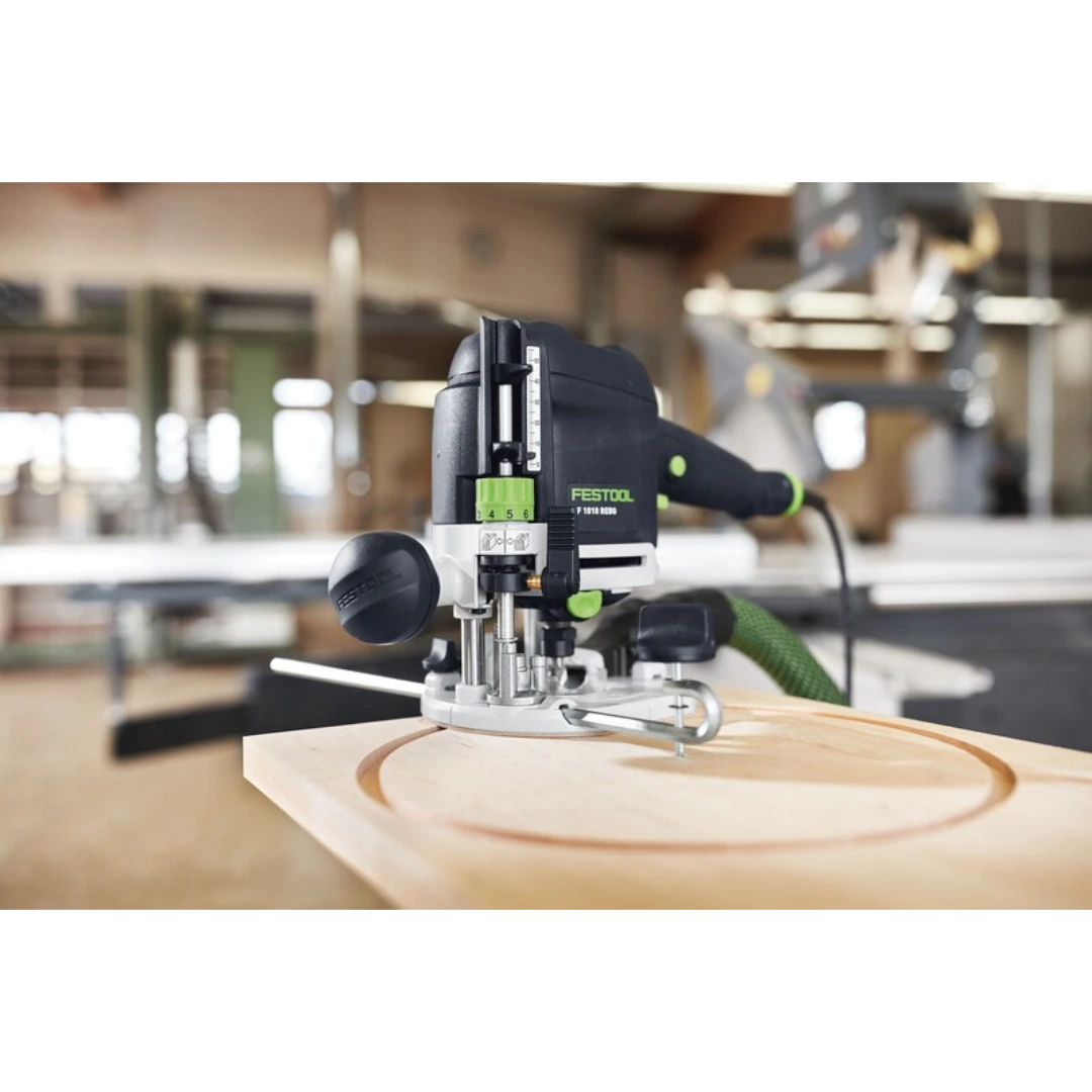 Festool router with trammel unit cutting precise circular grooves on wood in woodworking tool accessories collections