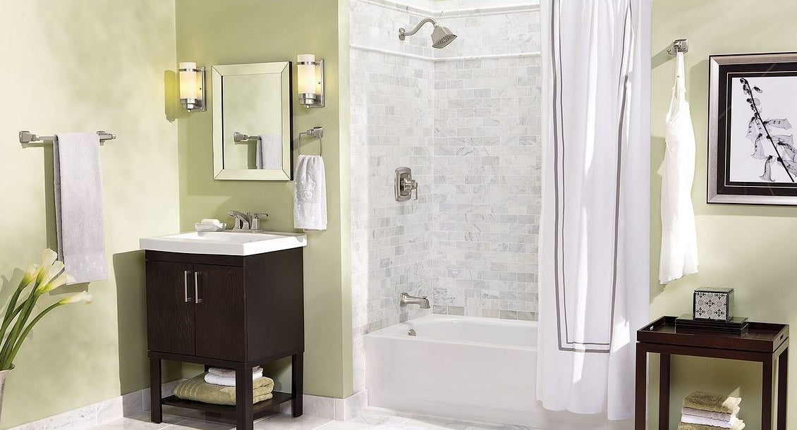 Brushed nickel tub and shower trim with lever handle in modern bathroom setting for bathroom and plumbing collections