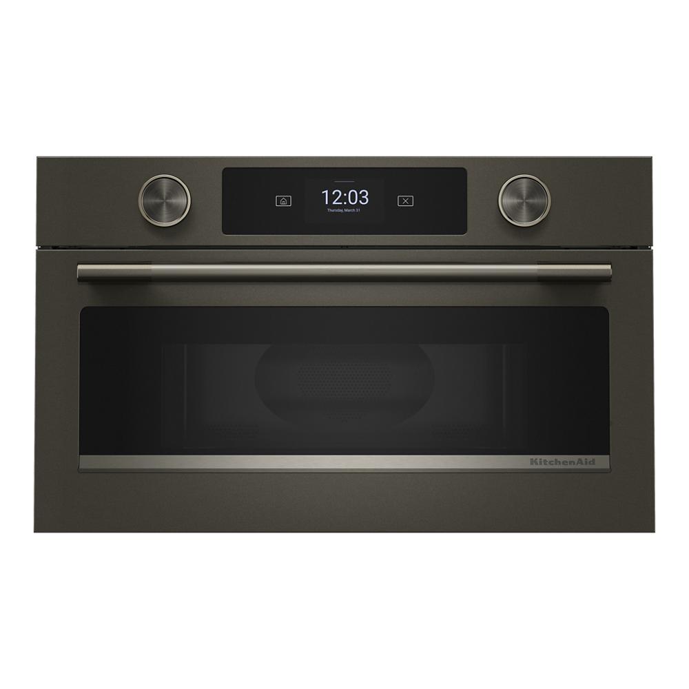 Built-in microwave oven with dark stainless steel finish, digital display, rotary knobs in KitchenAid Appliances collection