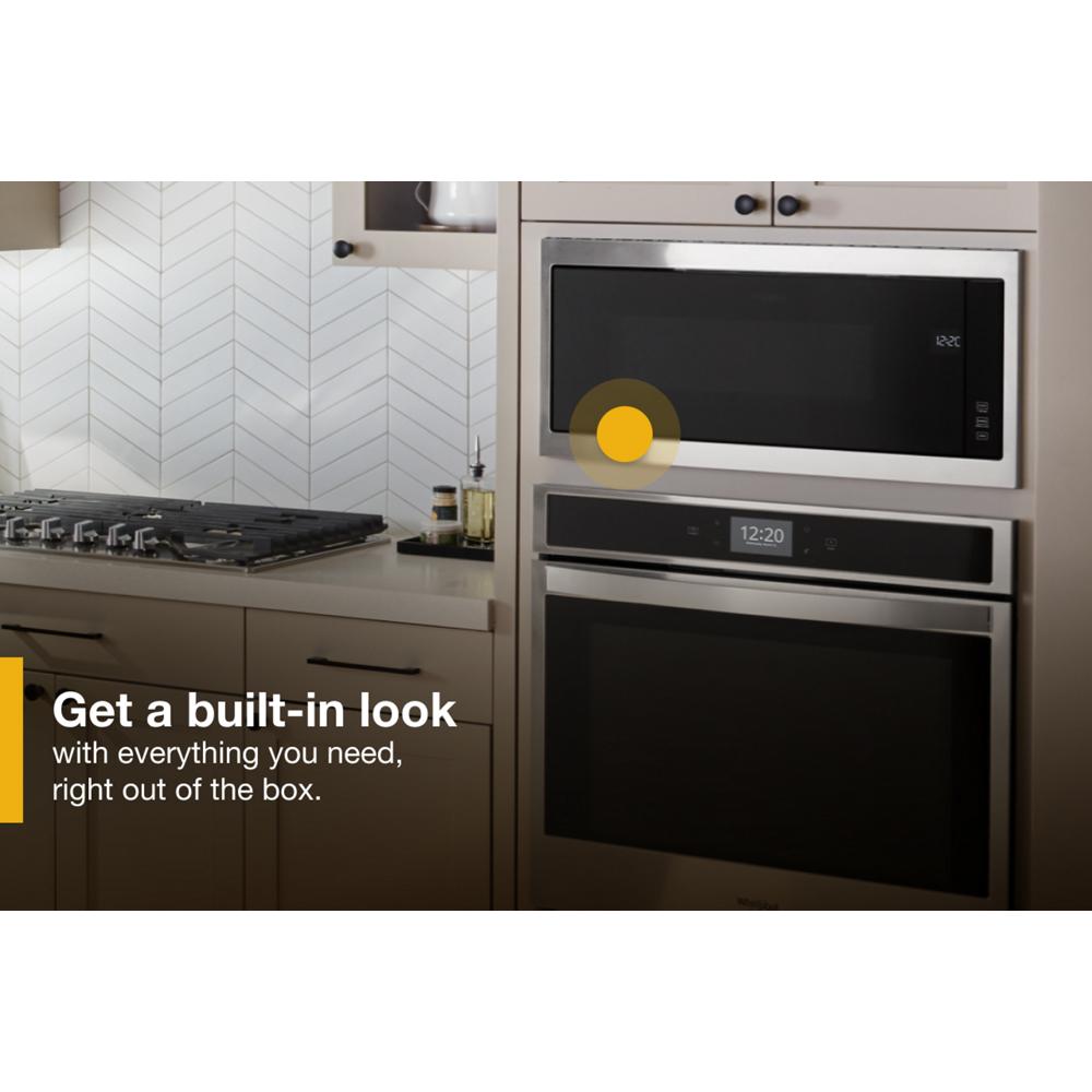 Modern kitchen with built-in microwave and oven integrated into cabinetry in Kitchen & Kitchenware and Appliances collections