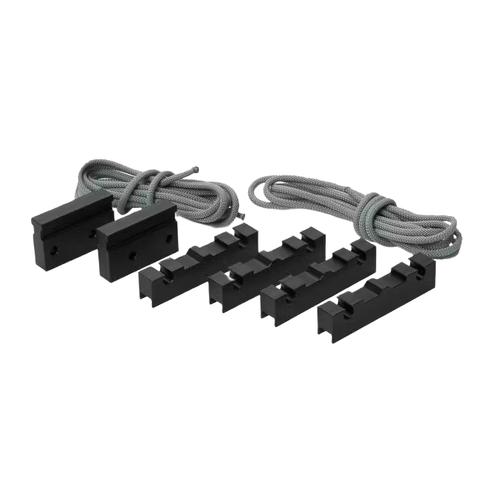 Set of black plastic glides and gray lifting lines for band sawmill maintenance in parts and lubricants collection