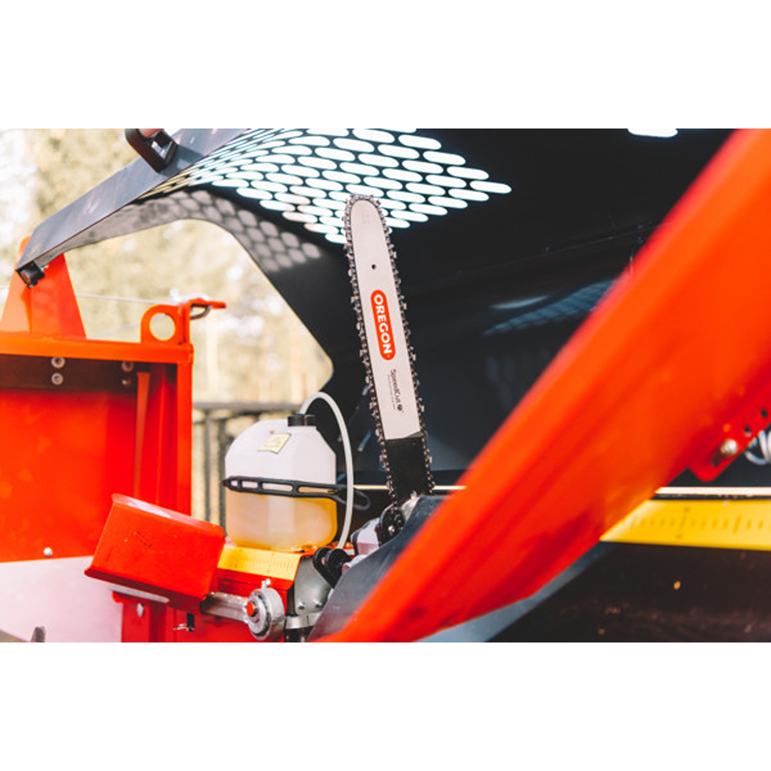 Close-up of cutting blade and hydraulic oil tank on orange firewood processor in log splitters and tools collection