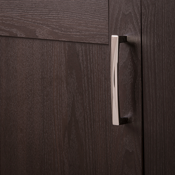 Chrome cabinet pull with smooth, slightly curved design on dark wood door, ideal for hardware and home improvement projects under $50