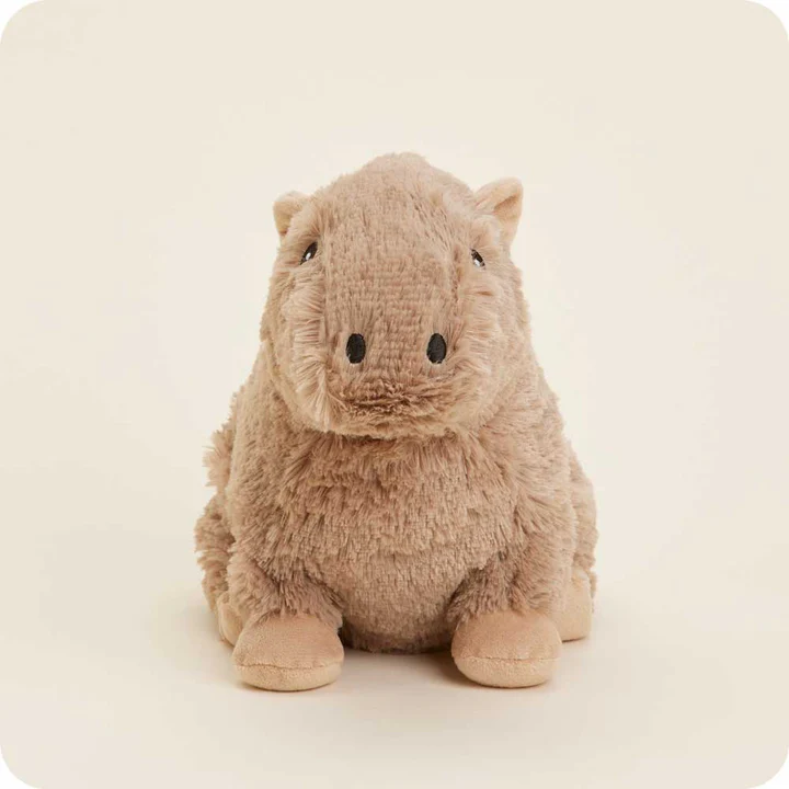 Soft plush capybara toy with a warm beige color and a cozy microwavable design for comfort.