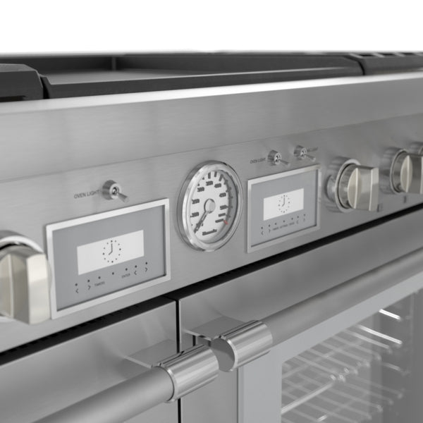 Close-up of stainless steel control panel with oven temperature gauge and digital displays on premium professional range