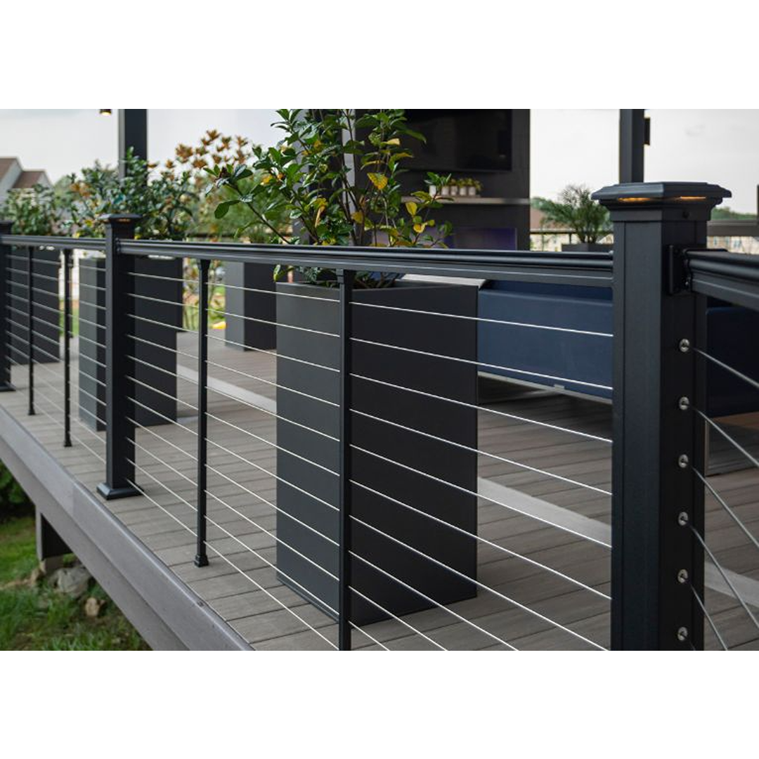 Black aluminum railing with horizontal stainless steel cables on outdoor deck for fencing and outdoor living spaces