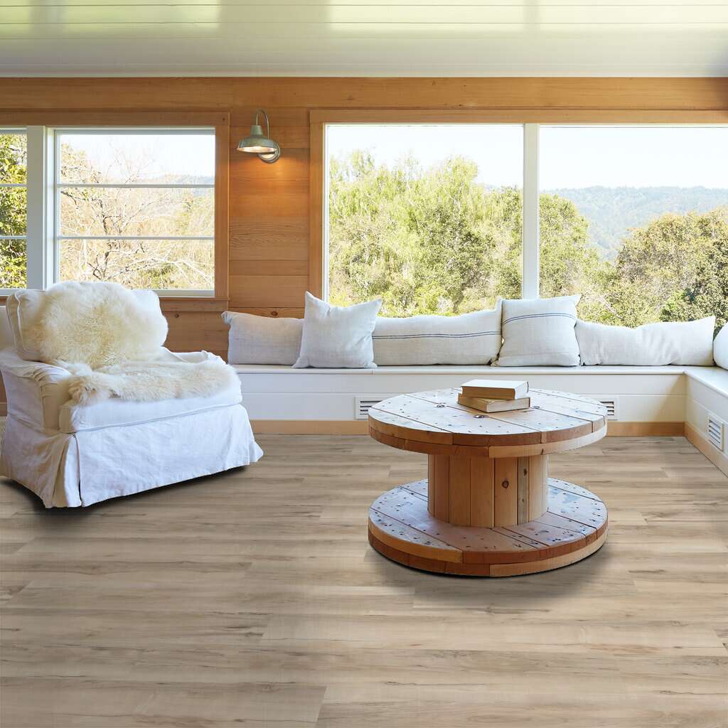Light natural wood-look vinyl flooring with mineral maple finish in bright living room from flooring and rugs collections under $100