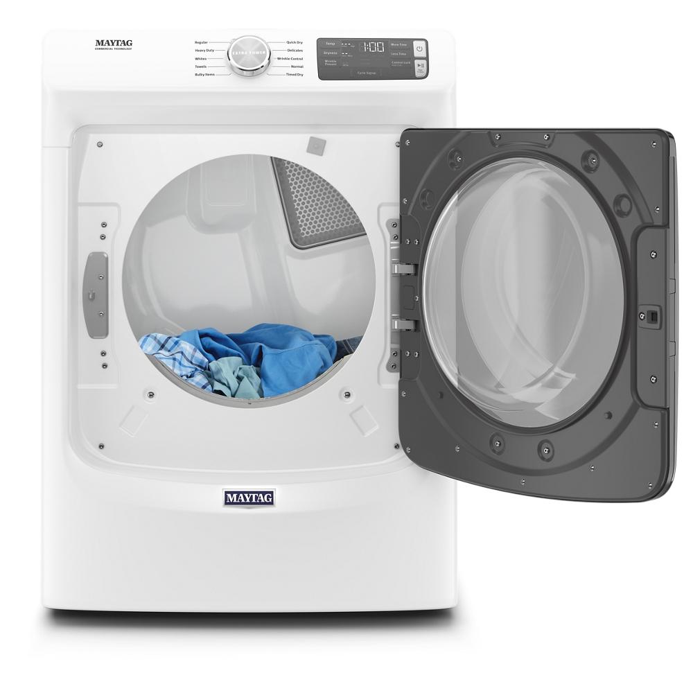 Front load electric dryer with open door showing interior and blue clothes in drum from Dryers collection