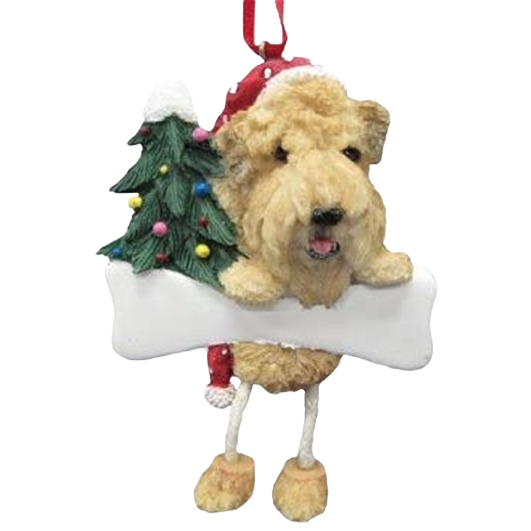 Playful Wheaten dog ornament with dangling legs holding decorated Christmas tree and bone for holiday decor under $50
