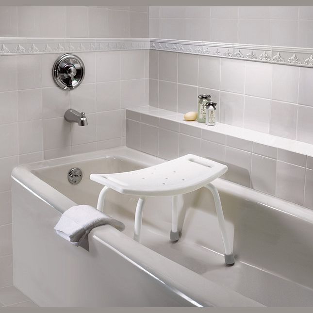White adjustable shower and tub seat with water-resistant surface and sturdy legs for bathroom safety and accessibility use