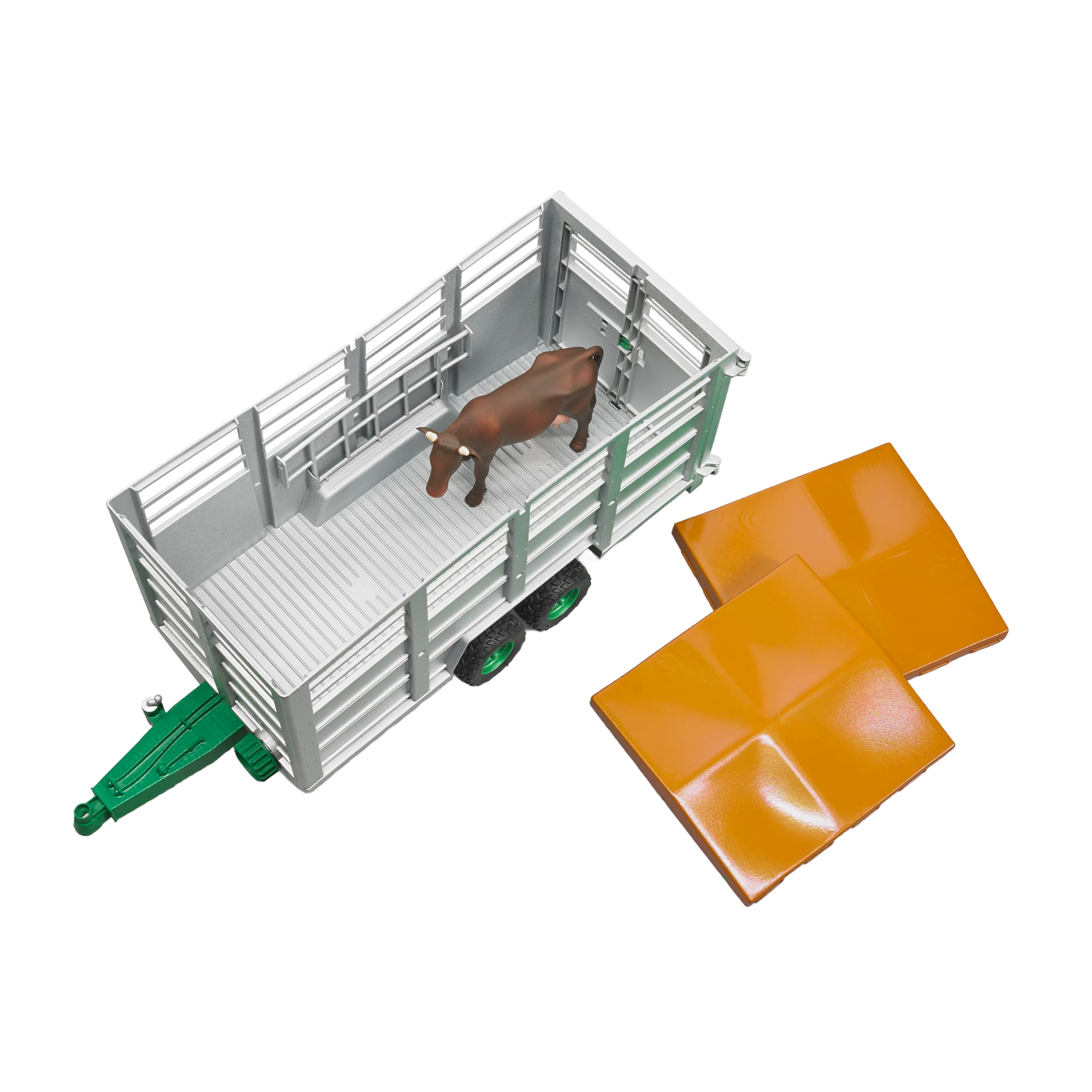 Gray livestock trailer toy with green hitch and black wheels, accompanied by a brown and black cow figure and orange ramps