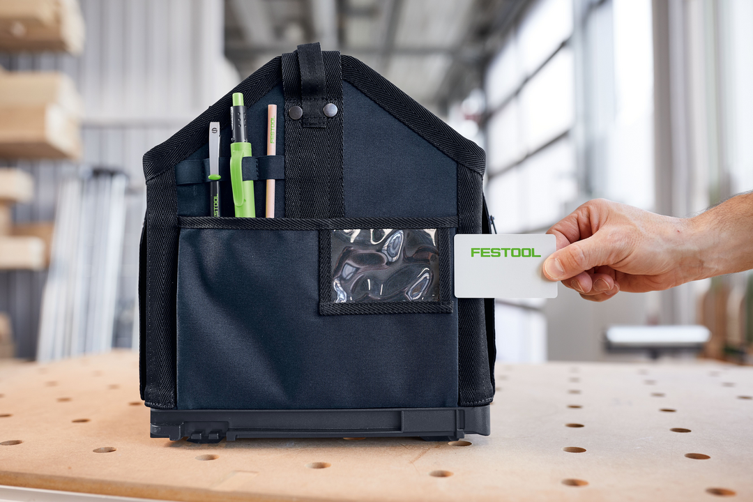 Compact black and green Festool tool bag with front pockets and card holder for organized workshop tool storage and easy access
