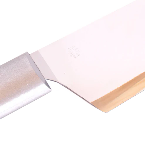 Close-up of a polished stainless steel chef's knife blade and handle from kitchen utensils and cooking tools collection.