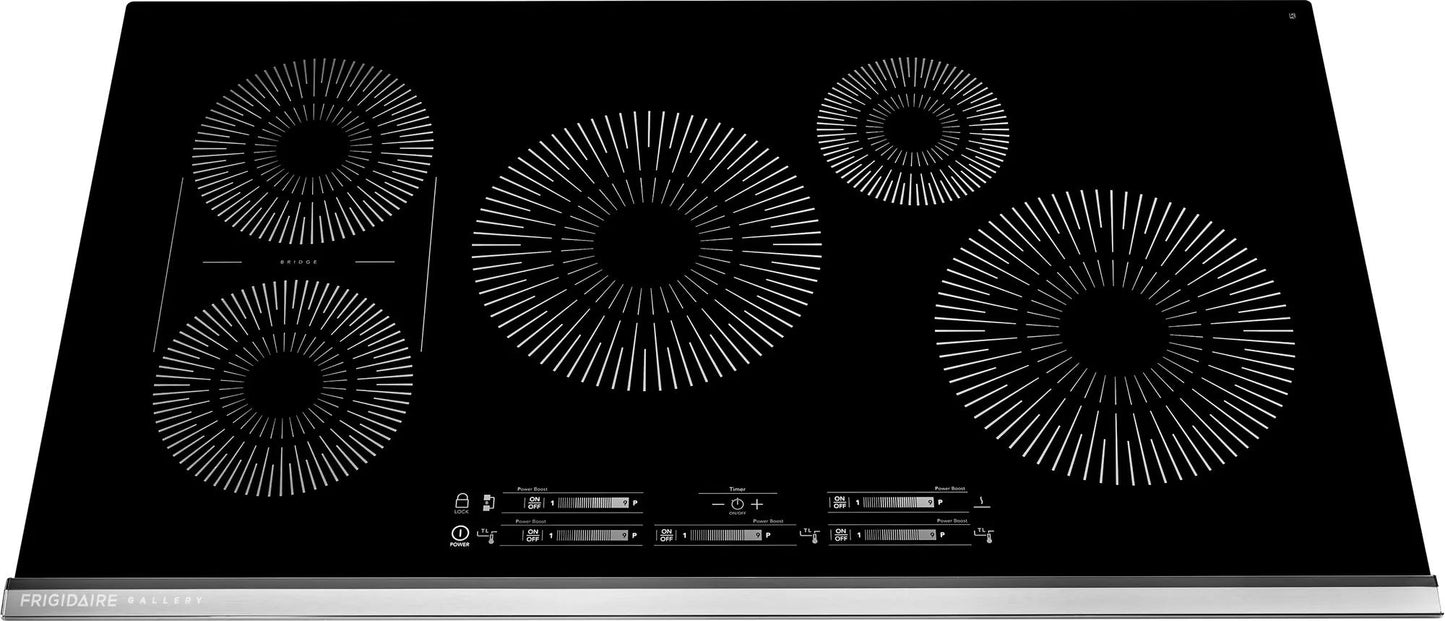 Modern black 36-inch induction cooktop with five heating zones and touch control panel in kitchen appliances collection