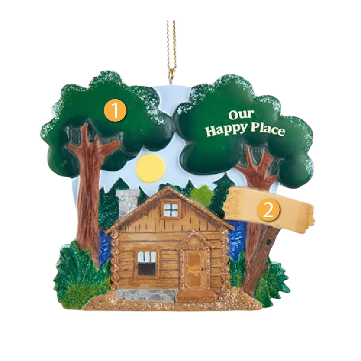 Personalized lake cabin ornament featuring a rustic wood cabin, green trees, and a sunlit sky scene