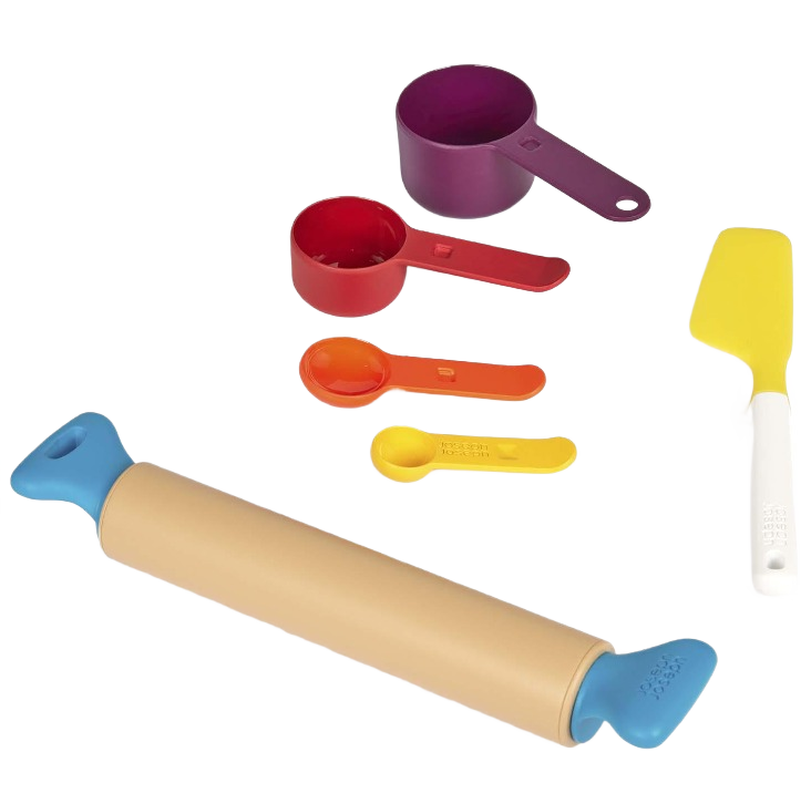 Colorful measuring cups, spoons, blue-handled rolling pin, and yellow spatula for baking and home use