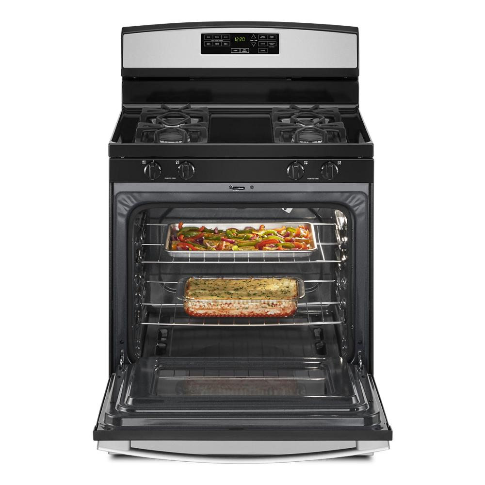 30-inch gas range with self-clean option showing oven interior with baked dishes and four-burner cooktop in appliance collection