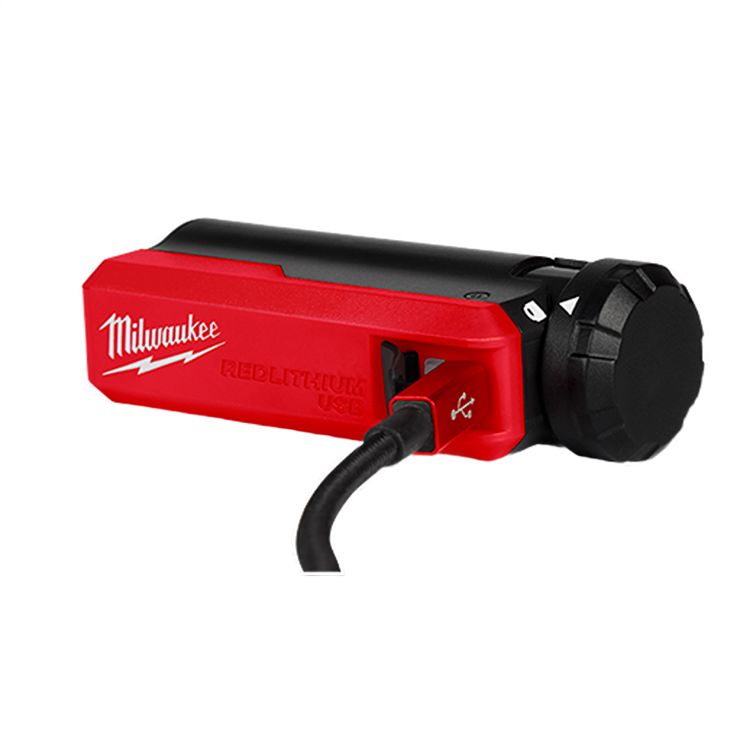 Compact red and black portable power source with USB cable for charging tools and home improvement devices