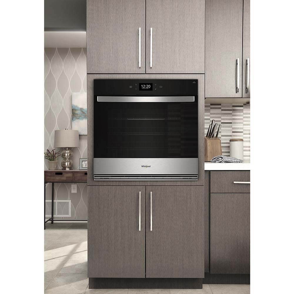 Stainless steel smart single wall oven with digital display, air fry feature, and sleek handle in kitchen appliances collection