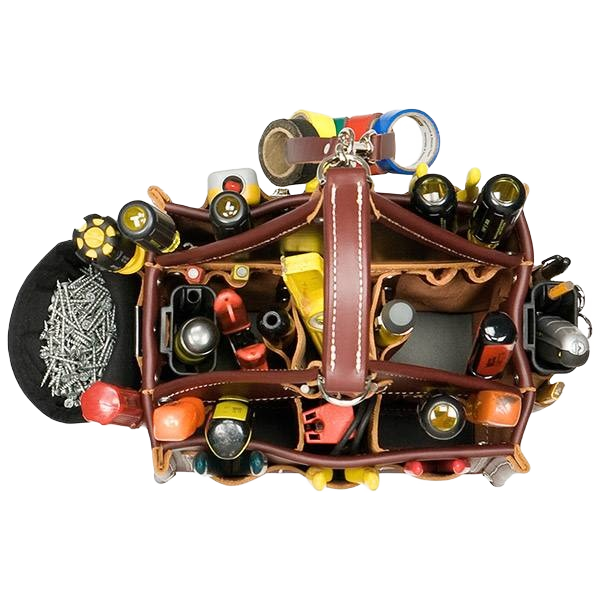 Leather tool tote organizer filled with hand tools and hardware for woodworking and home improvement projects