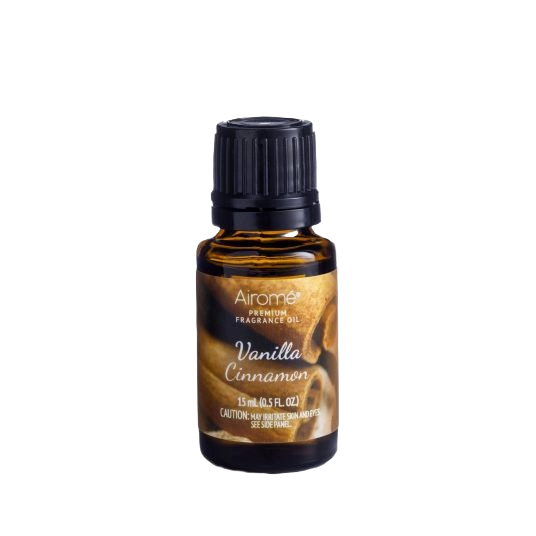 Small amber glass bottle of vanilla cinnamon fragrance oil with black cap, part of home decor and under $25 collection.
