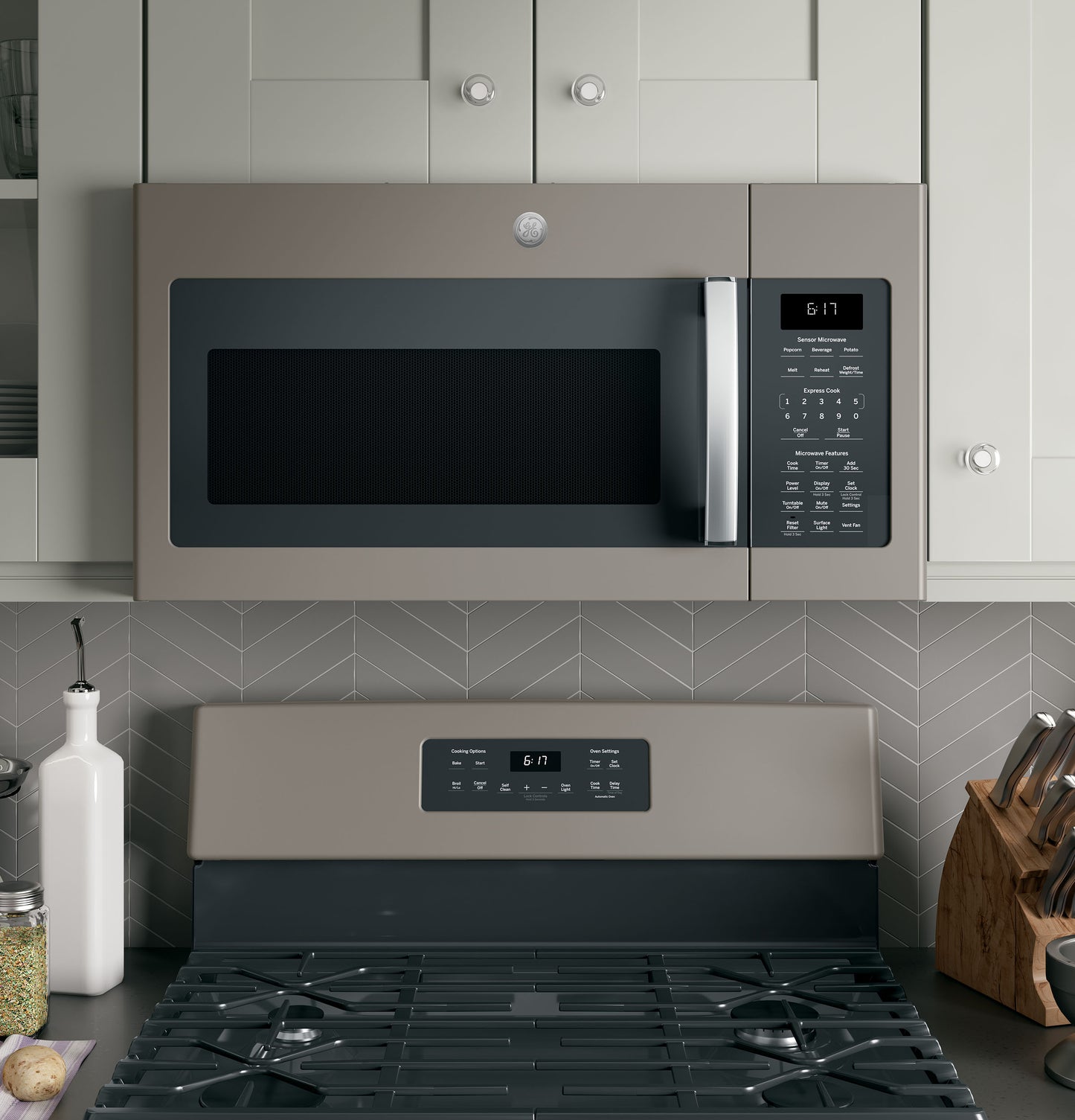 Over-the-range sensor microwave with digital control panel in a modern kitchen with stove and neutral cabinetry
