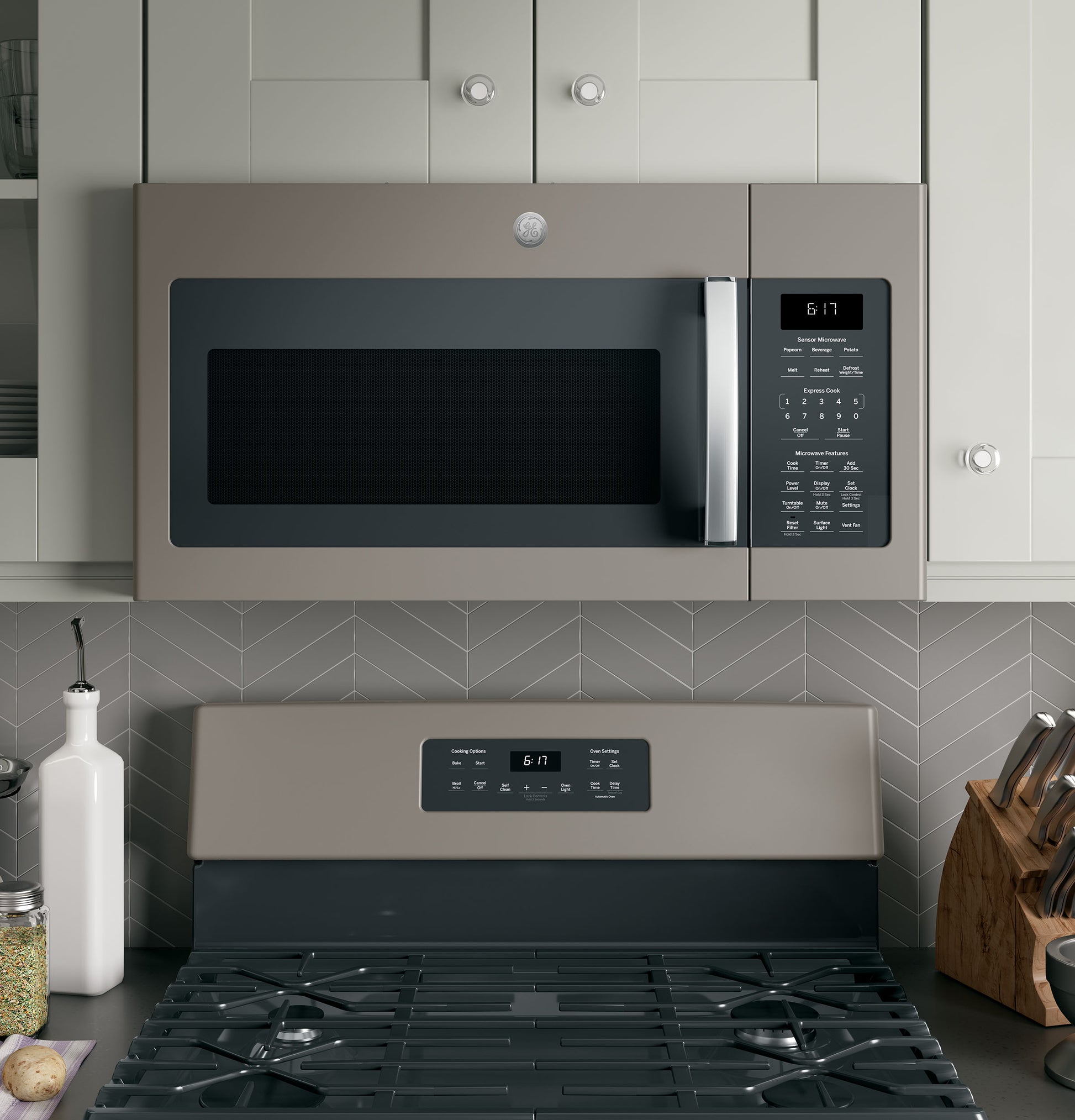 Over-the-range sensor microwave with digital control panel in a modern kitchen with stove and neutral cabinetry