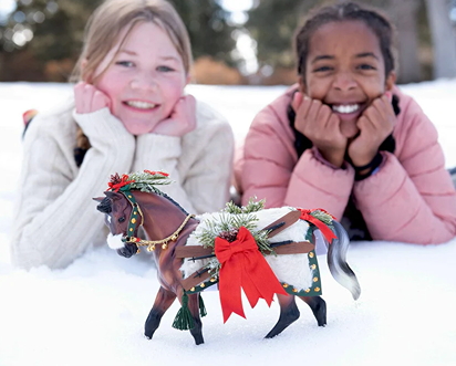 Bay warmblood horse figurine in winter blanket with festive red bow and greenery for Toys & Games under 100 collection