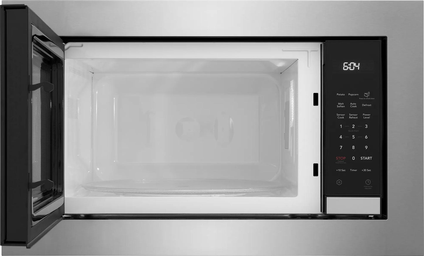 Open built-in microwave with digital control panel and LED clock for kitchen appliances and home improvement