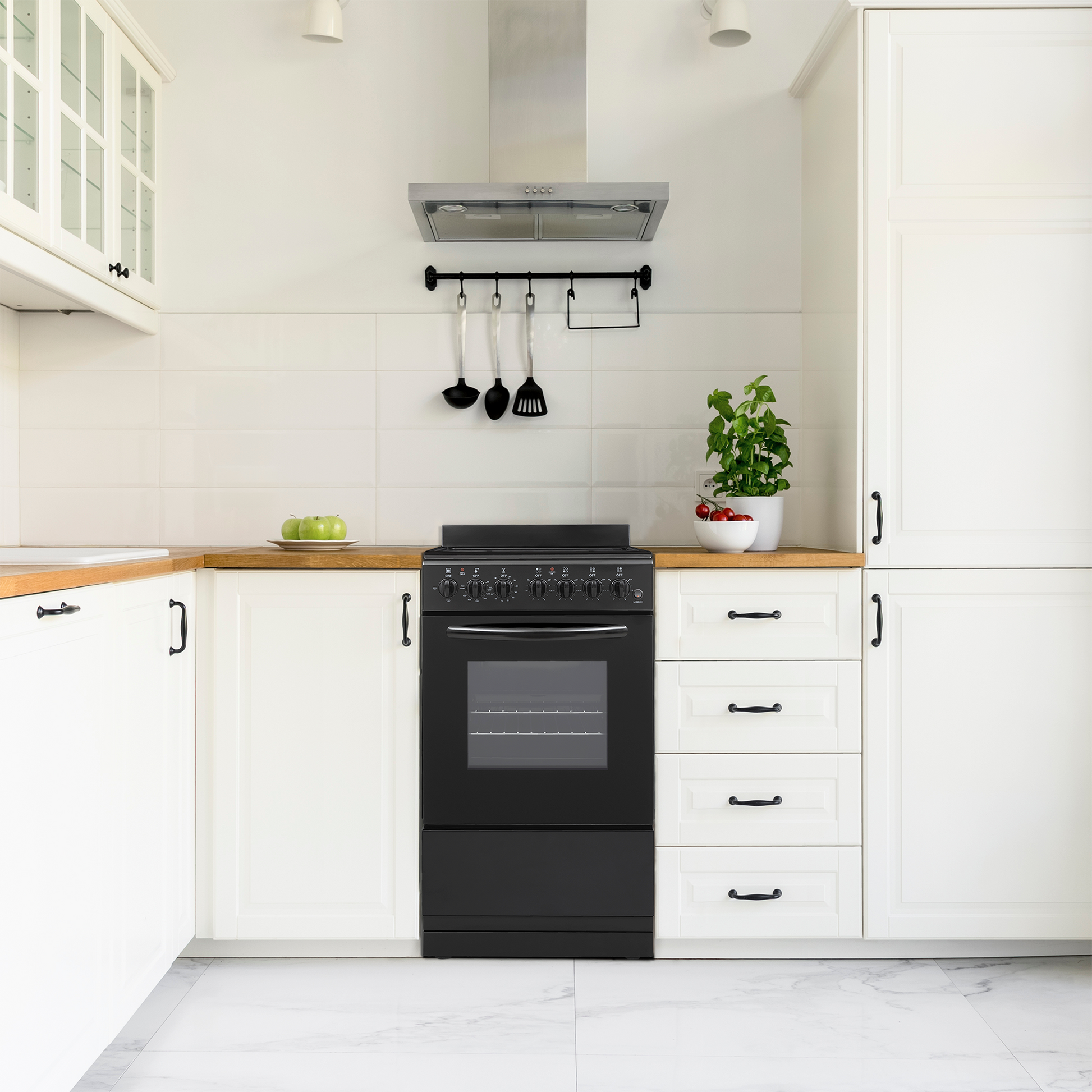 Black 20-inch electric range with glass oven window, multiple control knobs, set in a modern white kitchen with wood countertops