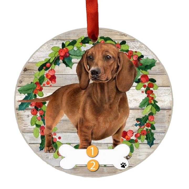 Round wooden Christmas ornament featuring a red dachshund with a festive holly and berry wreath background