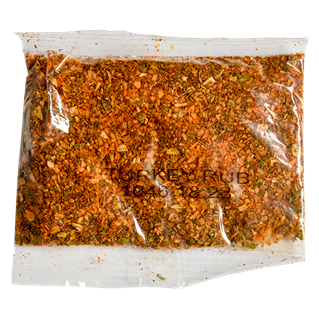 Clear pouch containing orange brine and seasoned turkey rub blend for cooking and grilling meals