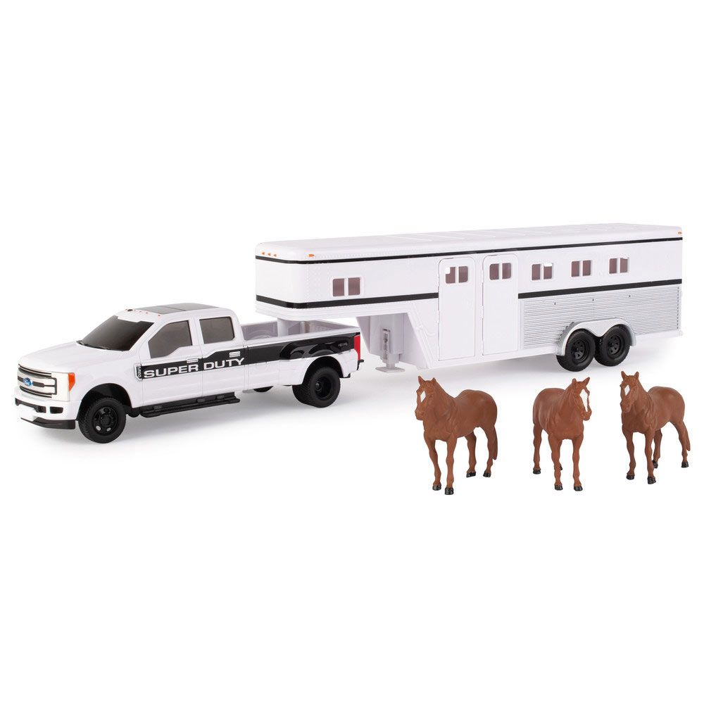 White and black toy pickup truck with horse trailer and three brown miniature horse figures for playsets