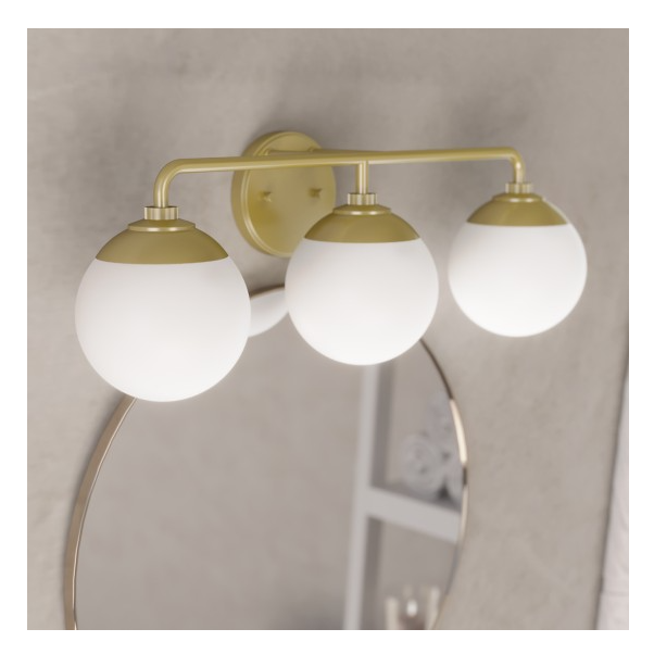 Three-light wall fixture with painted modern brass finish and frosted globe shades for bathroom vanity lighting