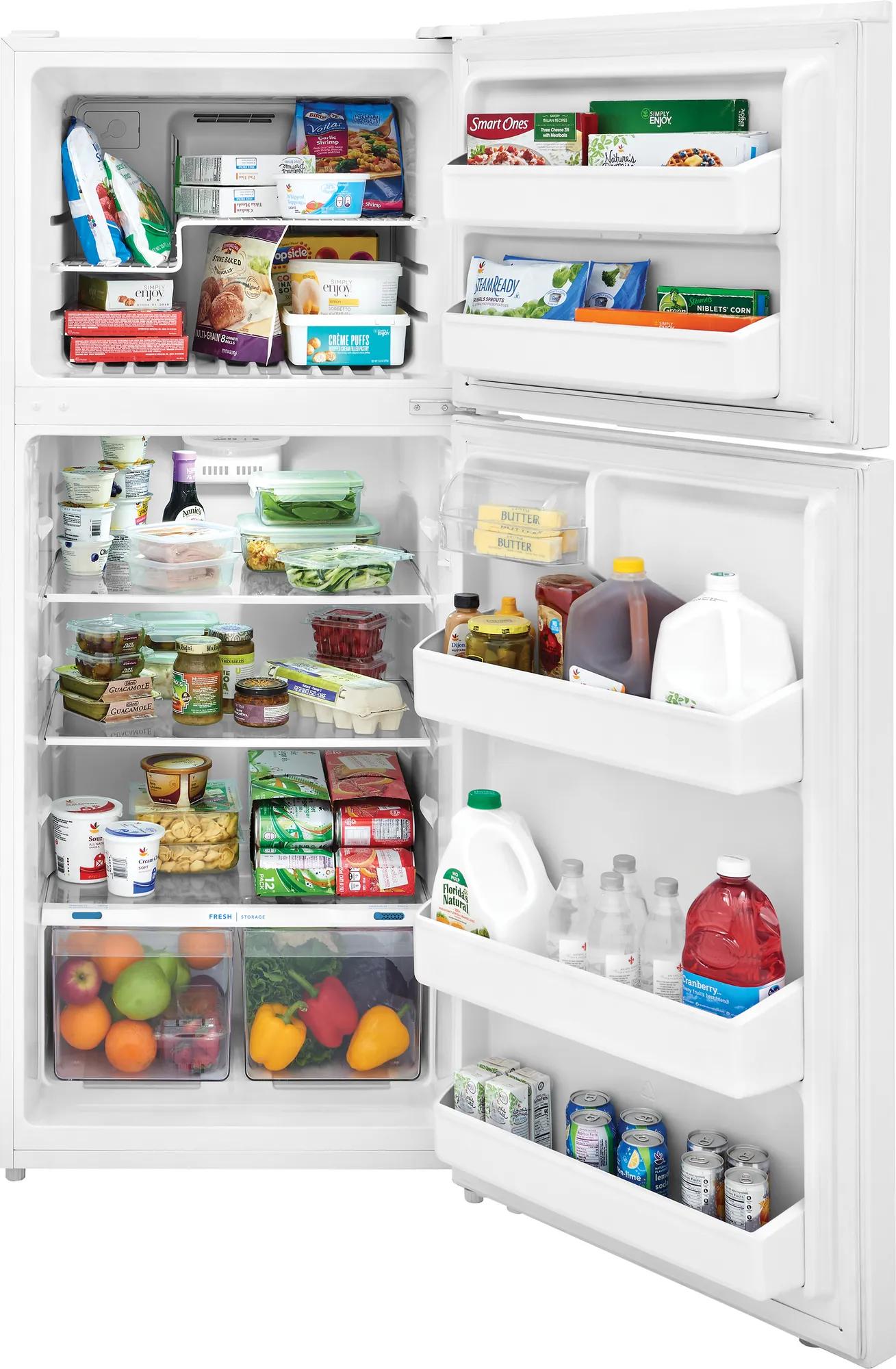 Open white top freezer refrigerator showing organized interior shelves stocked with food and beverages from kitchen appliances collection