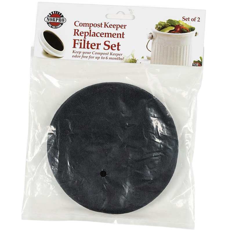 Set of two black circular compost filter refills in clear packaging for kitchenware odor control and maintenance.