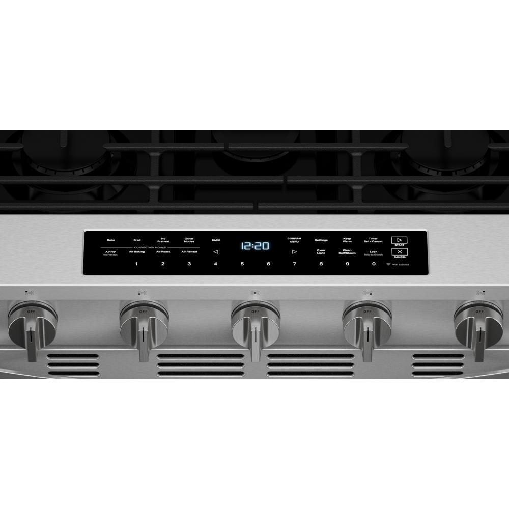 Control panel and five stainless steel knobs on a 30-inch smart slide-in gas range for kitchen appliances use