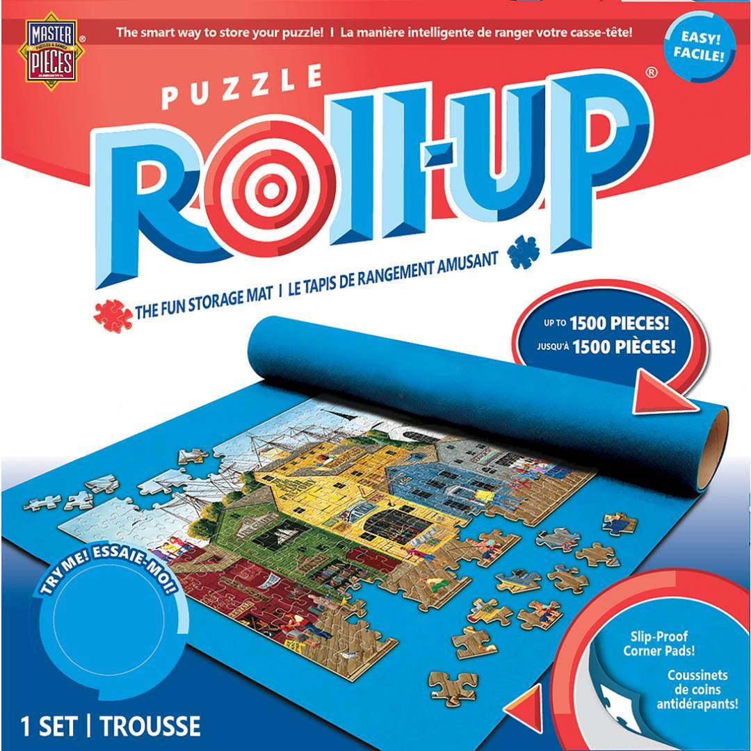 Box packaging of a blue puzzle roll-up mat partially rolled with a town scene puzzle mid-assembly on top
