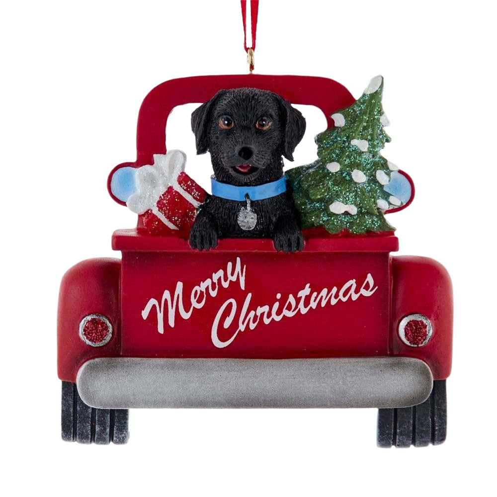 Black Labrador in red truck with Christmas tree and gifts, festive ornament from Christmas decorations under $50 collection
