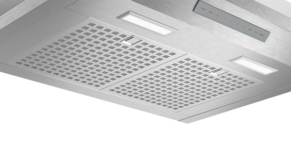 Stainless steel pyramid chimney wall hood underside with LED lights and ventilated range hood filters from Thermador collection