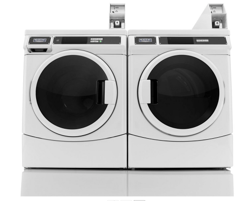 Pair of white commercial front-load washers with coin slots and digital displays from washers and appliances collection