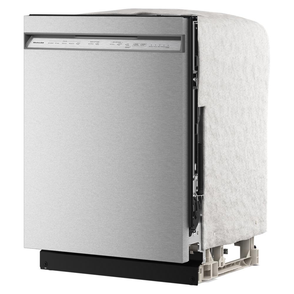 Partially assembled stainless steel dishwasher with control panel, insulation covering, and base support for kitchen installation.