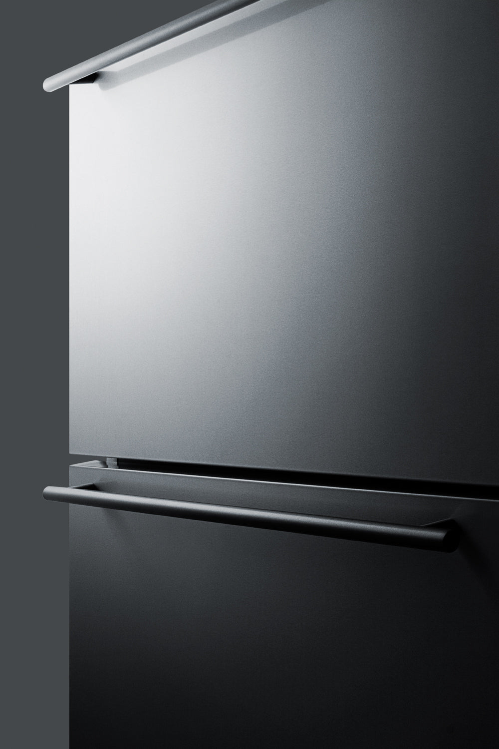 Minimalist close-up of stainless steel built-in two-drawer freezer in modern kitchen appliances and home improvement setting