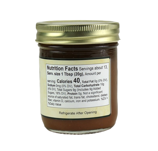 Back view of Hartville Kitchen pecan pumpkin butter jar showing nutrition facts label and gold lid in food and beverage collection