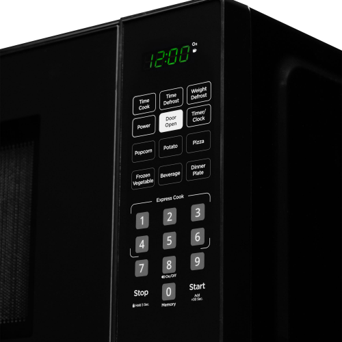 Close-up of black microwave digital control panel with preset buttons and green LED clock in kitchen appliances collection