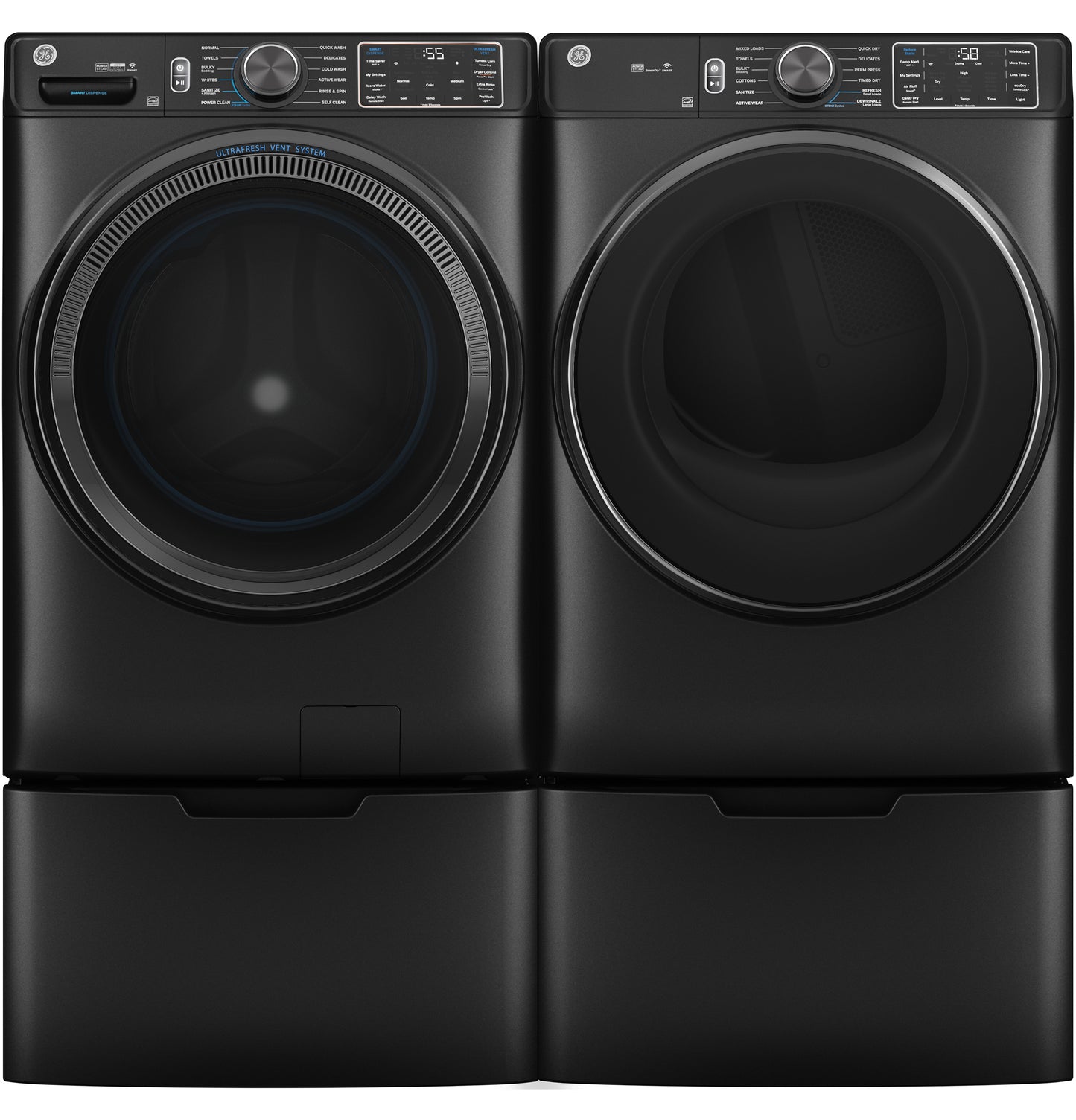 Black front load washer and dryer set on riser bases with digital controls in appliance parts and accessories collection