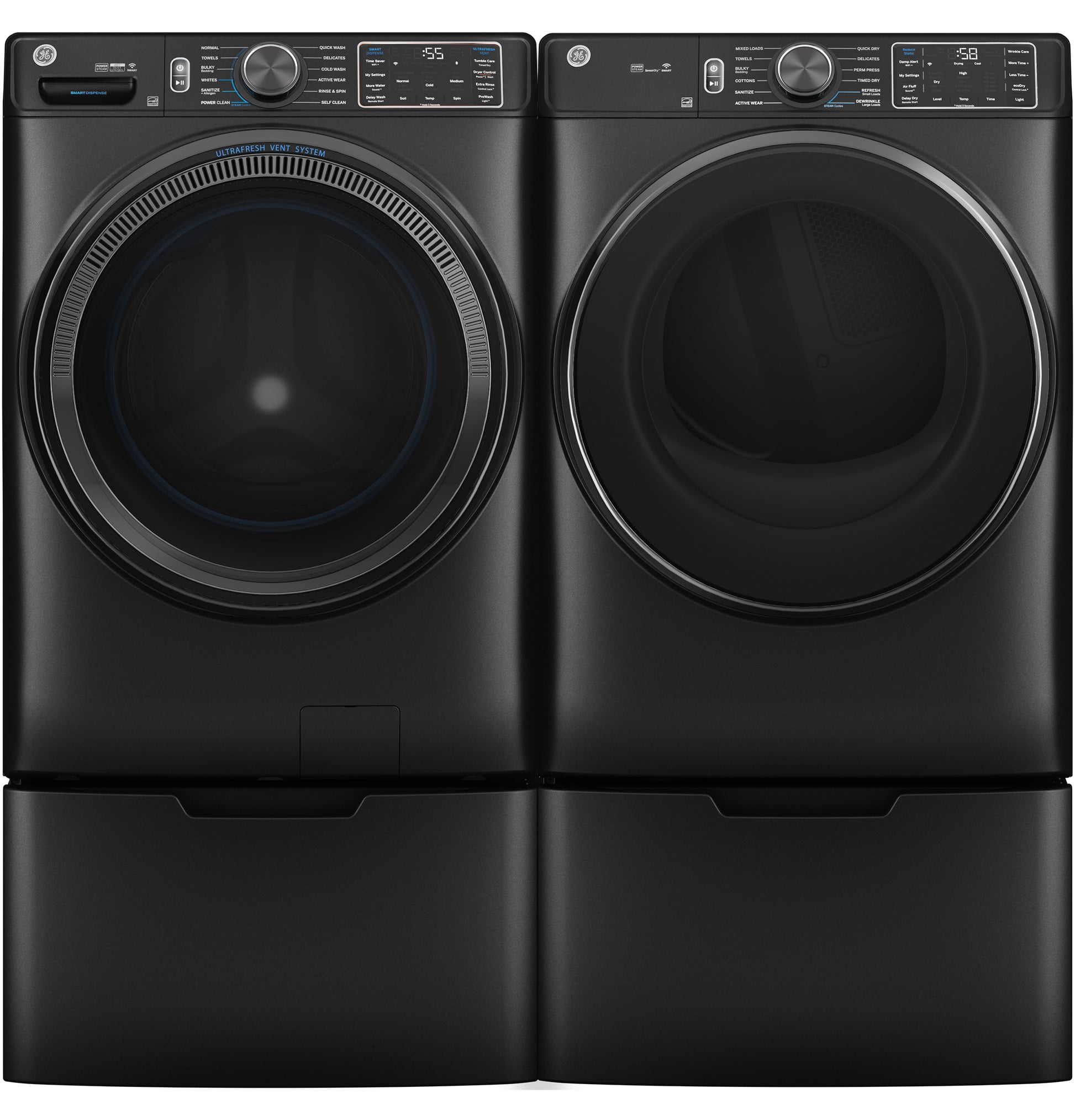 Black front load washer and dryer set on riser bases with digital controls in appliance parts and accessories collection