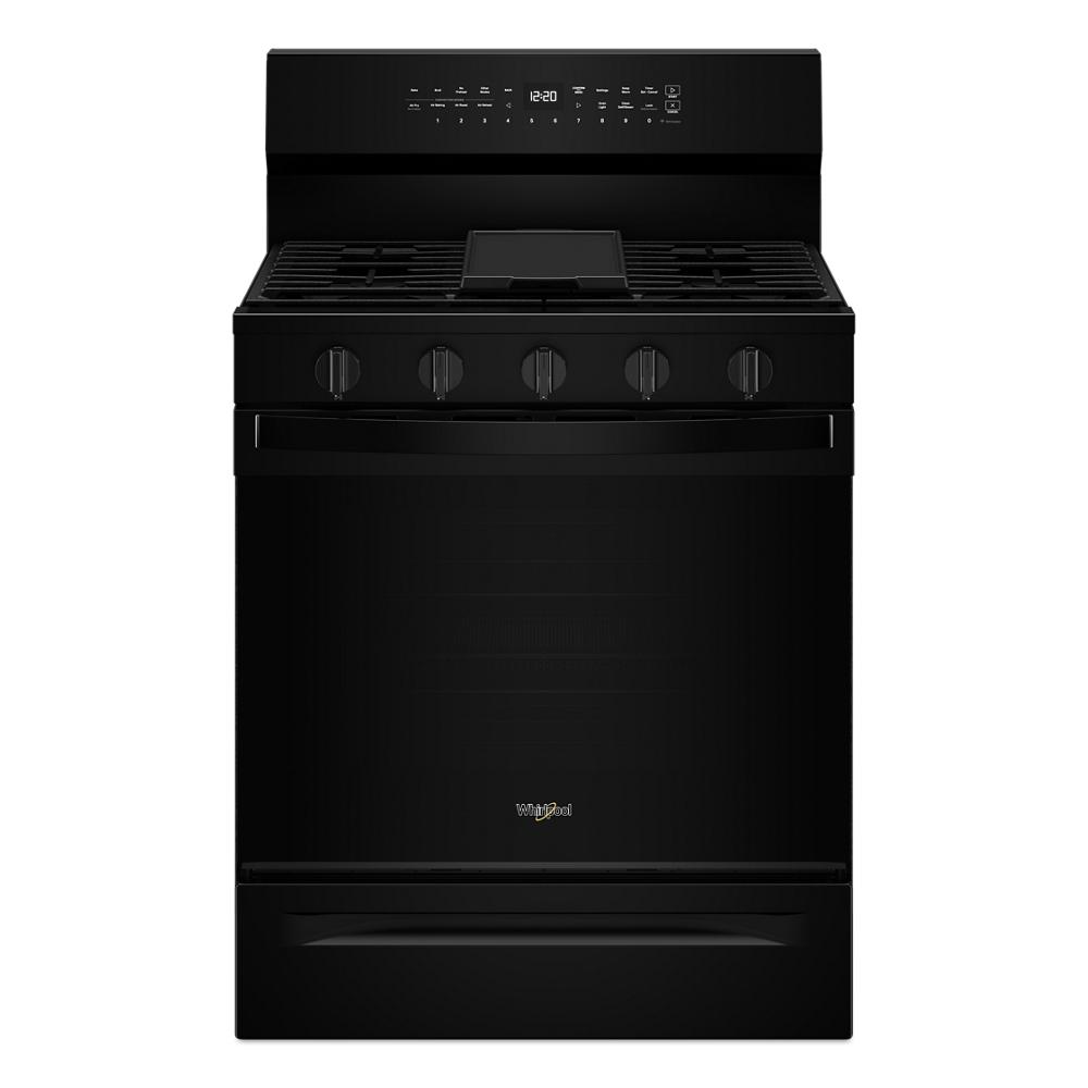 black freestanding gas range with five control knobs and digital display in kitchen appliances collection