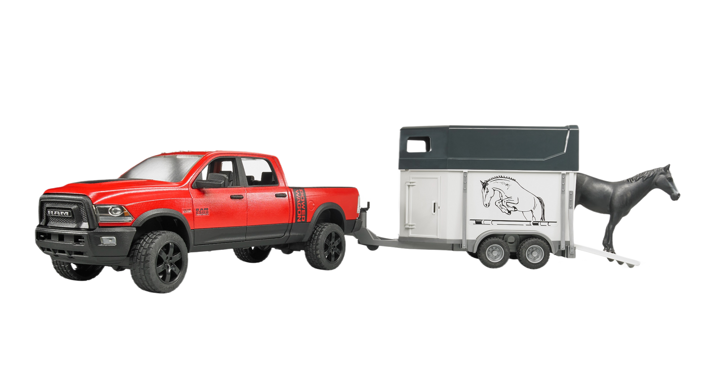 Red Bruder Ram 2500 toy pickup towing a gray horse trailer with black horse figure in vehicles and toys collection